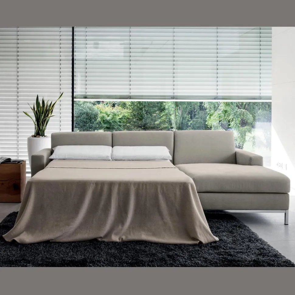 Divano Letto con Penisola in Metallo e Poliuretano Made in Italy - Folle