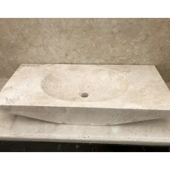 Lavabo bagno di design da appoggio in pietra bianca Vox, fatto a mano
