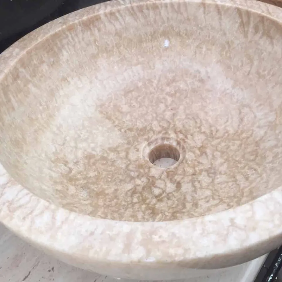 Lavabo in pietra naturale da appoggio Ana di design, fatto a mano