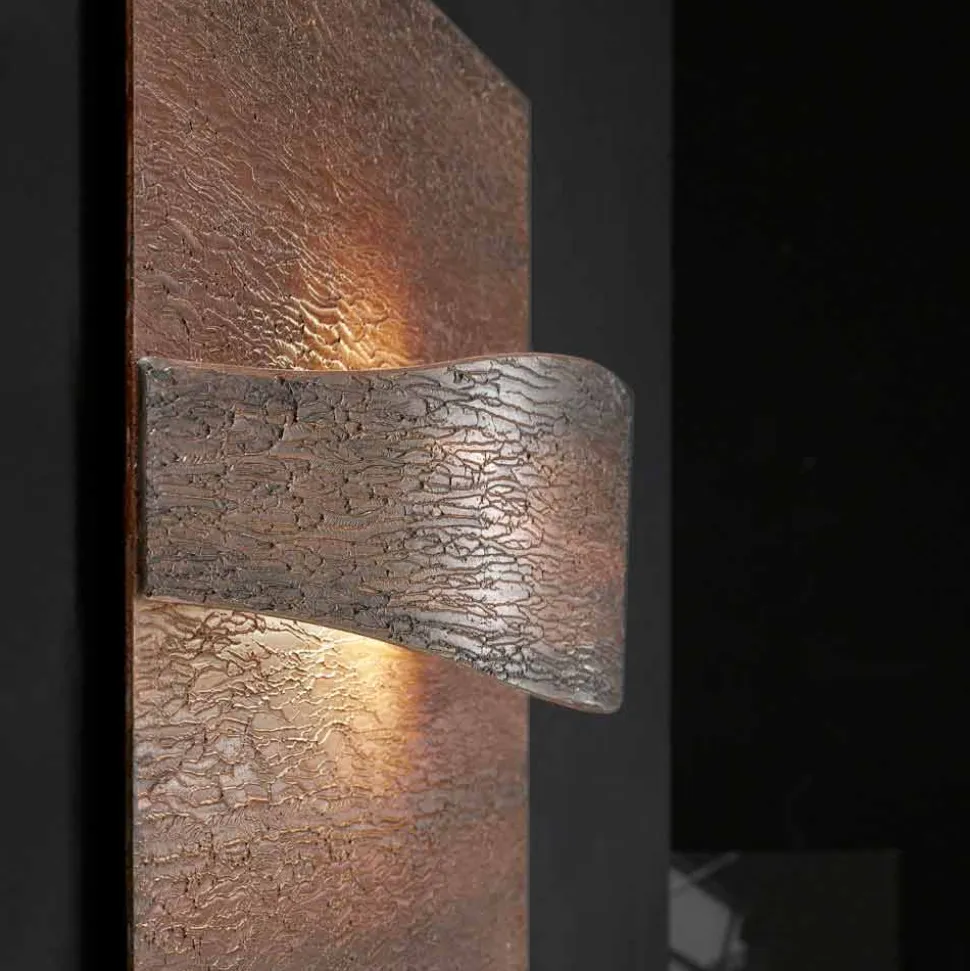 Selene Art&Light applique con pannelli texturizzati fatti a mano